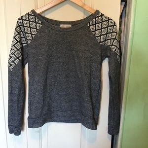 Grey Sweater with a Cool design shoulders
